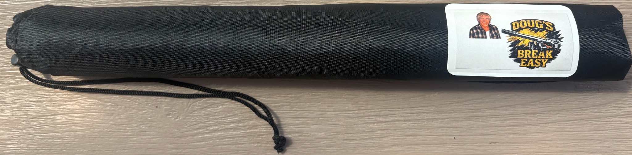 Black drawstring vinyl carrying bag